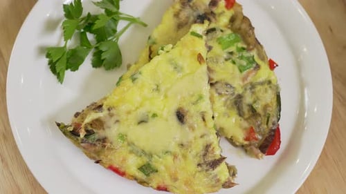 Fish and Vegetables Omelet Served on a Plate