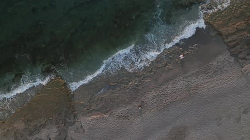 Aerial View The Mediterranean Horizon Bursts with Fiery Colors During Sunset with Dramatic Clouds