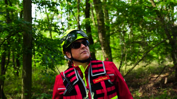 Woman rescuer walk in forest, People Stock Footage ft. woman & uniform ...