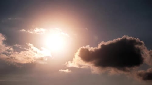 Timelapse of Dramatic Sunset with Sun Rays in the Sky Through Orange Clouds