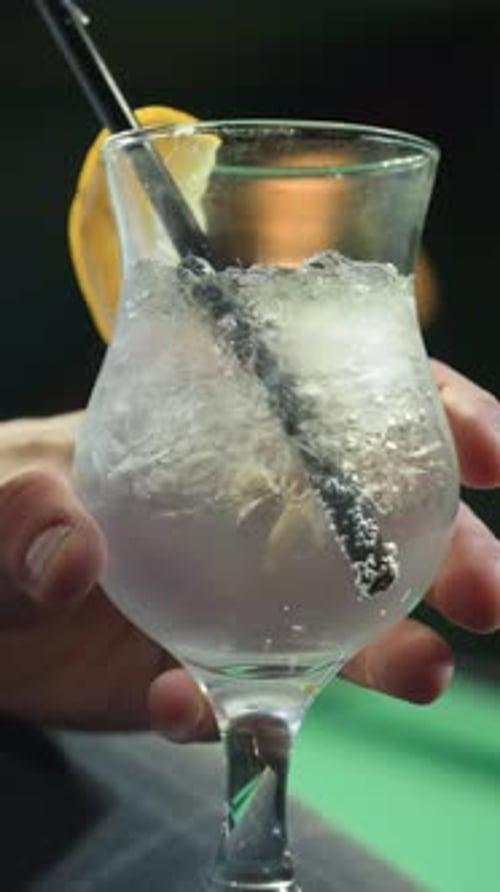 Refreshing Lemon Drink with Ice and Straw