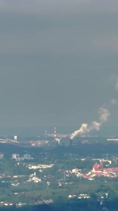 Industrial Power Plant with Cooling Towers and Chimneys Aerial View