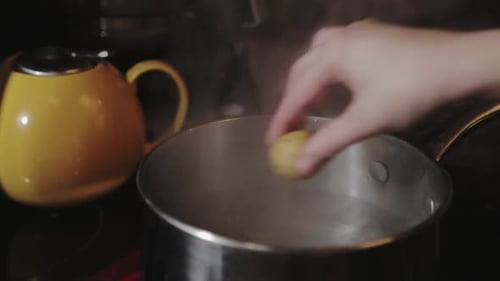 Cooking Potatoes In A Boiling Pot - Close Up Shot