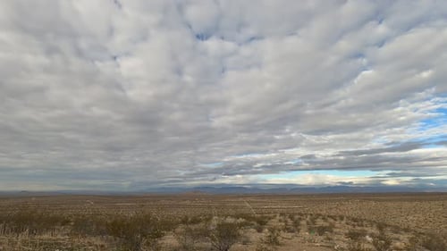 Clouds rolling over the beautiful Mojave desert - time lapse