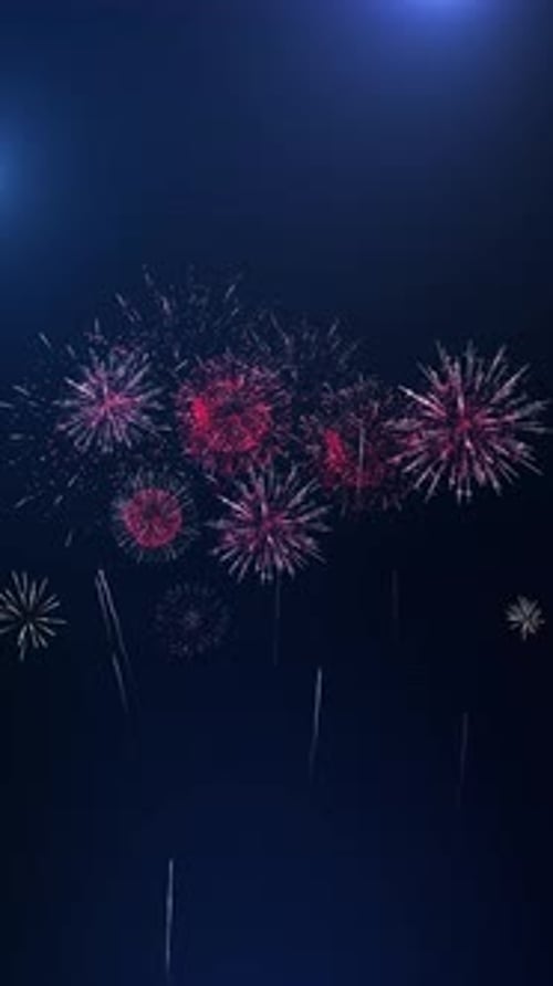 Real fireworks display on dark sky, event celebration Explosions fireworks background of night sky.