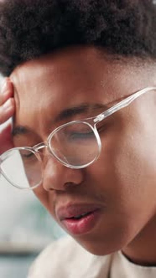 Office, man and stress with headache for business deadline, anxiety or burnout at creative agency