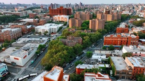 Footage above the residential area with green neighborhoods. Top view on the cityscape of New York