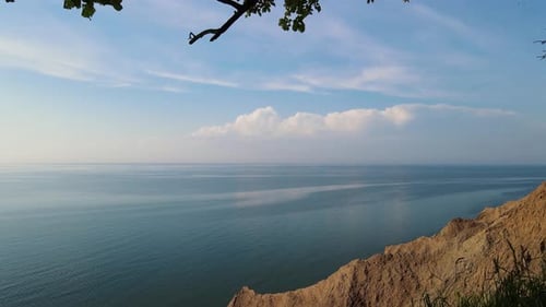 opening reveal of cliffs and ocean