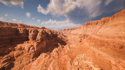 Broad Scarlet Canyon Displays Stratified Rocks and Erosion Features Clearly