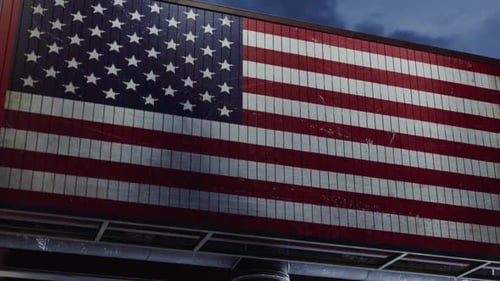 Slatted Billboard with American Flag Reveals Text