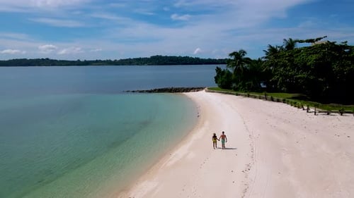 Couple at a Tropical Beach in Thailand Ocean of Koh Kham Near Koh Mak
