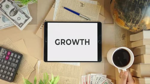 GROWTH DISPLAYING ON FINANCE TABLET SCREEN