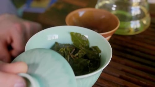 Preparing Green Tea in Ceramic Bowl