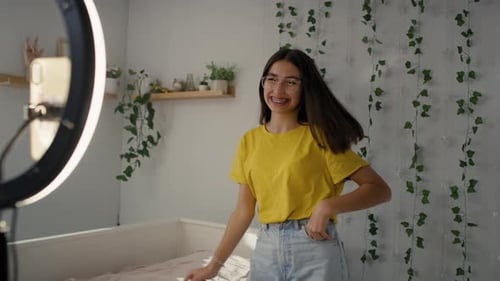 Teen Dancing and Recording Video in Bedroom