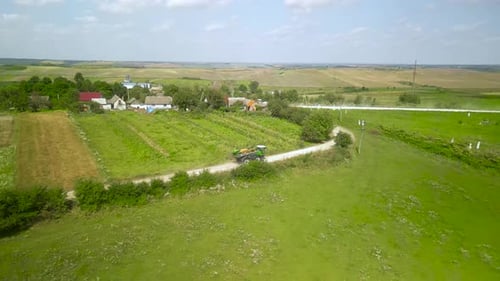 Spray Fertilize On Field With Chemicals In Agriculture Field