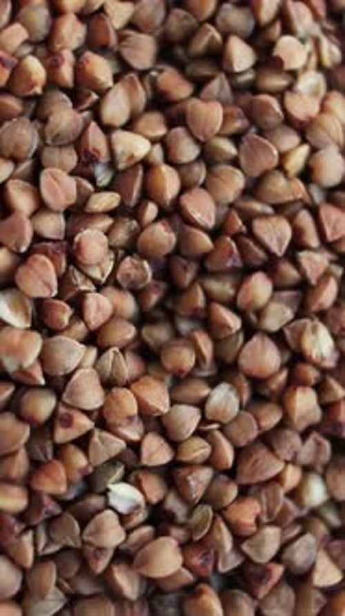 Buckwheat Seeds Fill the Frame in Close Up