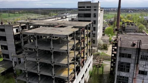 Destroyed buildings. Abandoned territory of an old industrial plant.