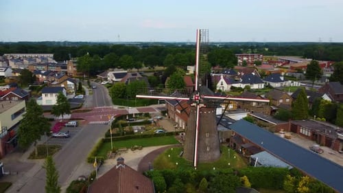 Dutch Windmill located in a old village in Holland