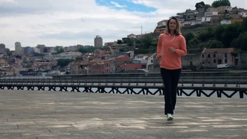 Young Woman Jogging in City, Super 240