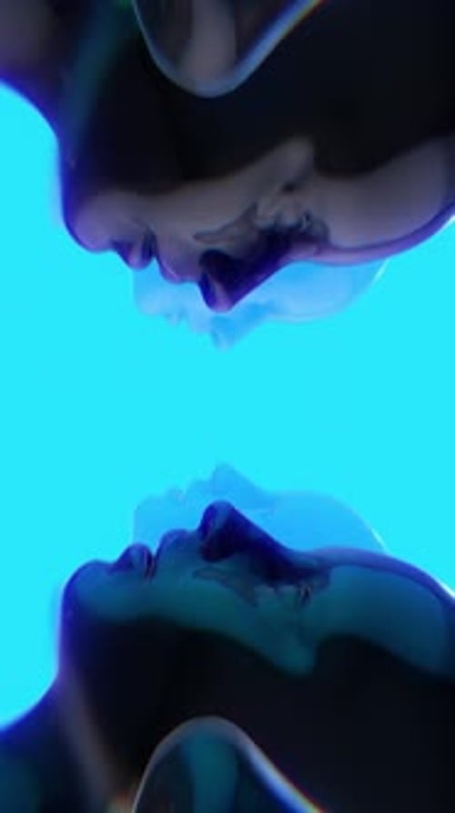 Abstract Fluid Faces Vertical Loop