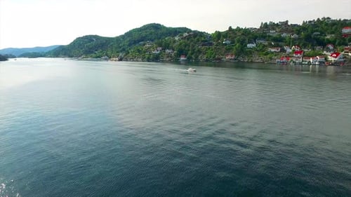 Drone, water and travel by boat in nature, sea transportation and vacation by lake town for tropical