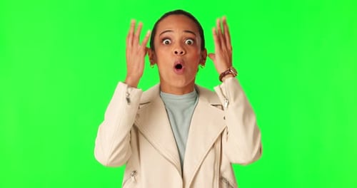 Green screen, face and woman with mind blown hands in studio for wtf, news