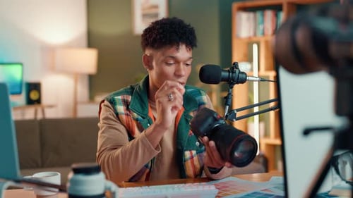 Content creator, microphone and camera with man in studio for influencer, advice or broadcast