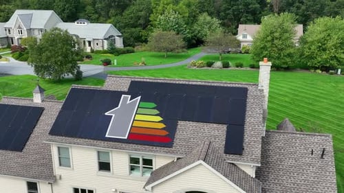 House with solar panels and energy rating graphic on roof. Large home in USA neighborhood with effic