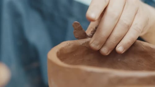 Girl Learns Pottery and Shapes the Clay in the Pottery Workshop During Masterclass
