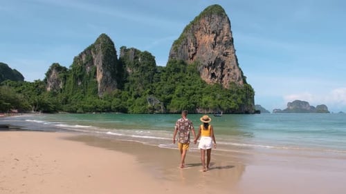 Strolling Along the Tranquil Beaches of Railay Beach Krabi Thailand By the Stunning Limestone Cliffs