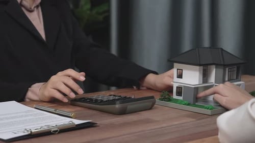 Real Estate Agent Explains New Home to Client