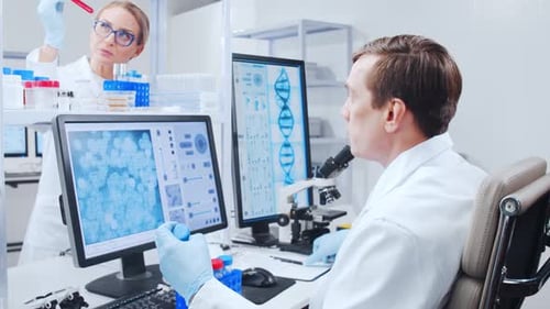 Scientists Working in Modern Medical Research Laboratory