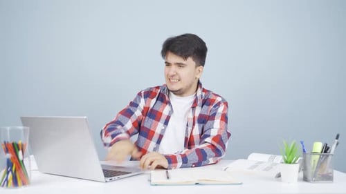 The man who got angry at what he saw on the laptop.