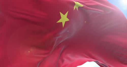 Realistic Waving China Flag Against Blue Sky
