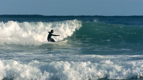 Surfer Rides Wave, Hawaii 20-25 Years