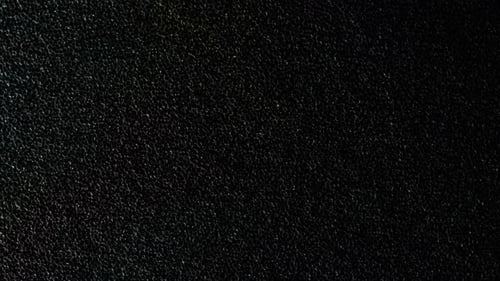 Are those all people's heads, all in a crowd, seen from above? Probably not