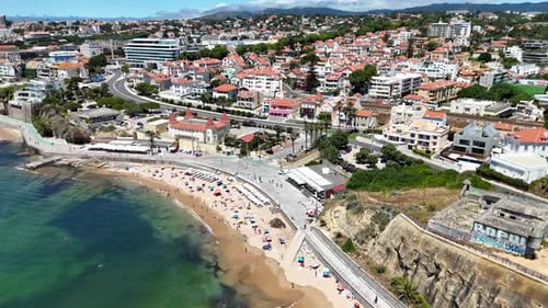 Aerial View of a Beautiful Scenic Coastal Town Featuring a Sandy Beach and a Vibrant Neighborhood