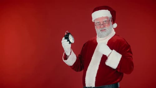 Santa Claus Holding an Alarm Clock, Red Background