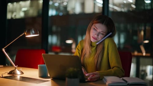 Overtime Employee Talking Cellphone Sitting Dark Office Closeup Yawning Woman