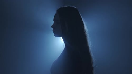 Moody Face in Dark Light