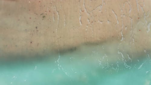 Big Waves rolling from above. Top down 4k drone view on blue turquoise ocean, breaking waves, whitew