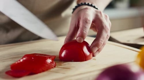 Close Up of Slicing Red Bell Pepper