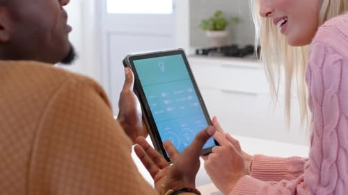 Couple Controlling Smart Home with Tablet