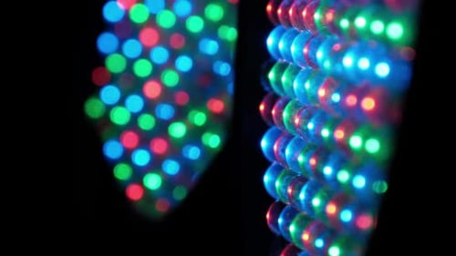 Abstract Colorful Bokeh Lights Display on Dark Background