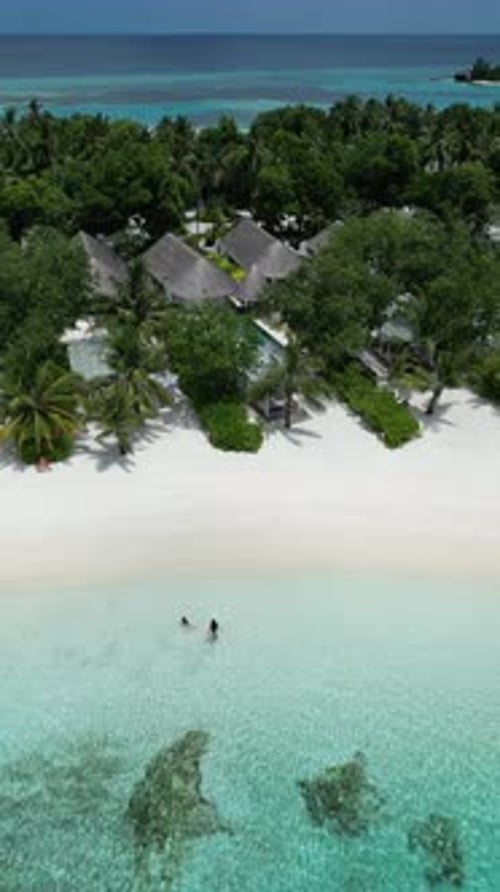 Serene Beach at Four Seasons Resort Maldives