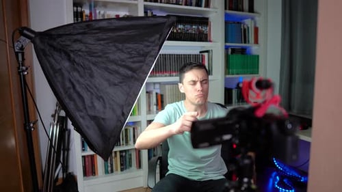Man Talking to Camera in Home Studio