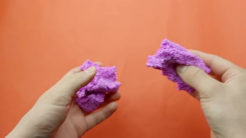 Kneading Pink Floam Slime for ASMR with Bold Red Background