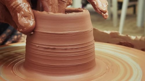 Shaping A Clay Pot In A Ceramics Workshop 29