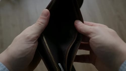 Close Up Man Hands Opening an Empty Wallet Financial Crisis and Despair No Money Poverty Concept