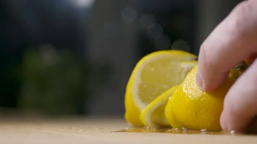 Cutting Fresh Spraying Lemon
